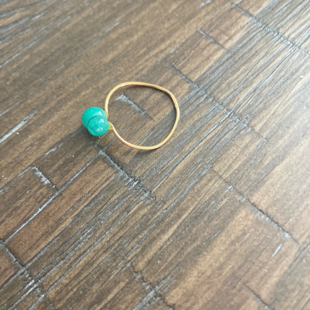 Elegant Gold Ring with 2 Jade Beads